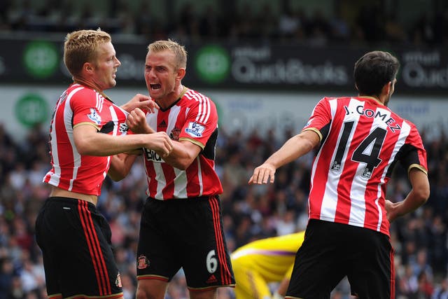Sebastian Larsson and Lee Cattermole celebrate after the former scores an equalising goal in the 2-2 draw between West Brom and Sunderland