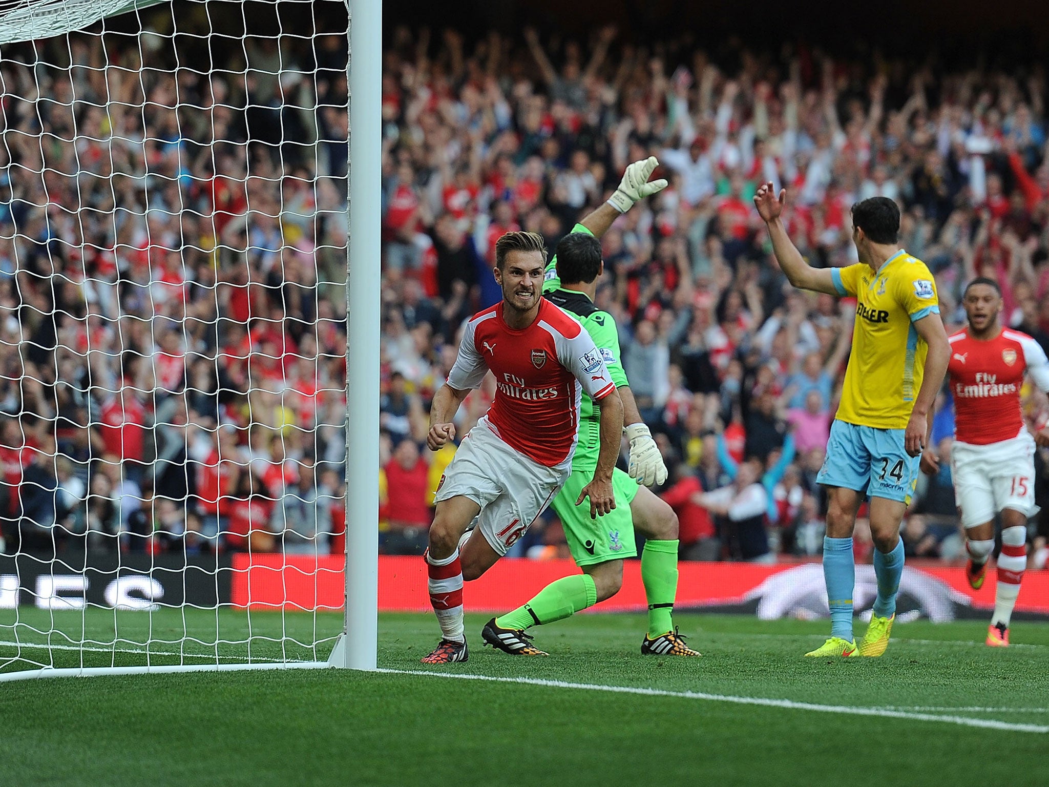 Aaron Ramsey knocks in the winning goal to give Arsenal a 2-1 victory over Crystal Palace on Saturday