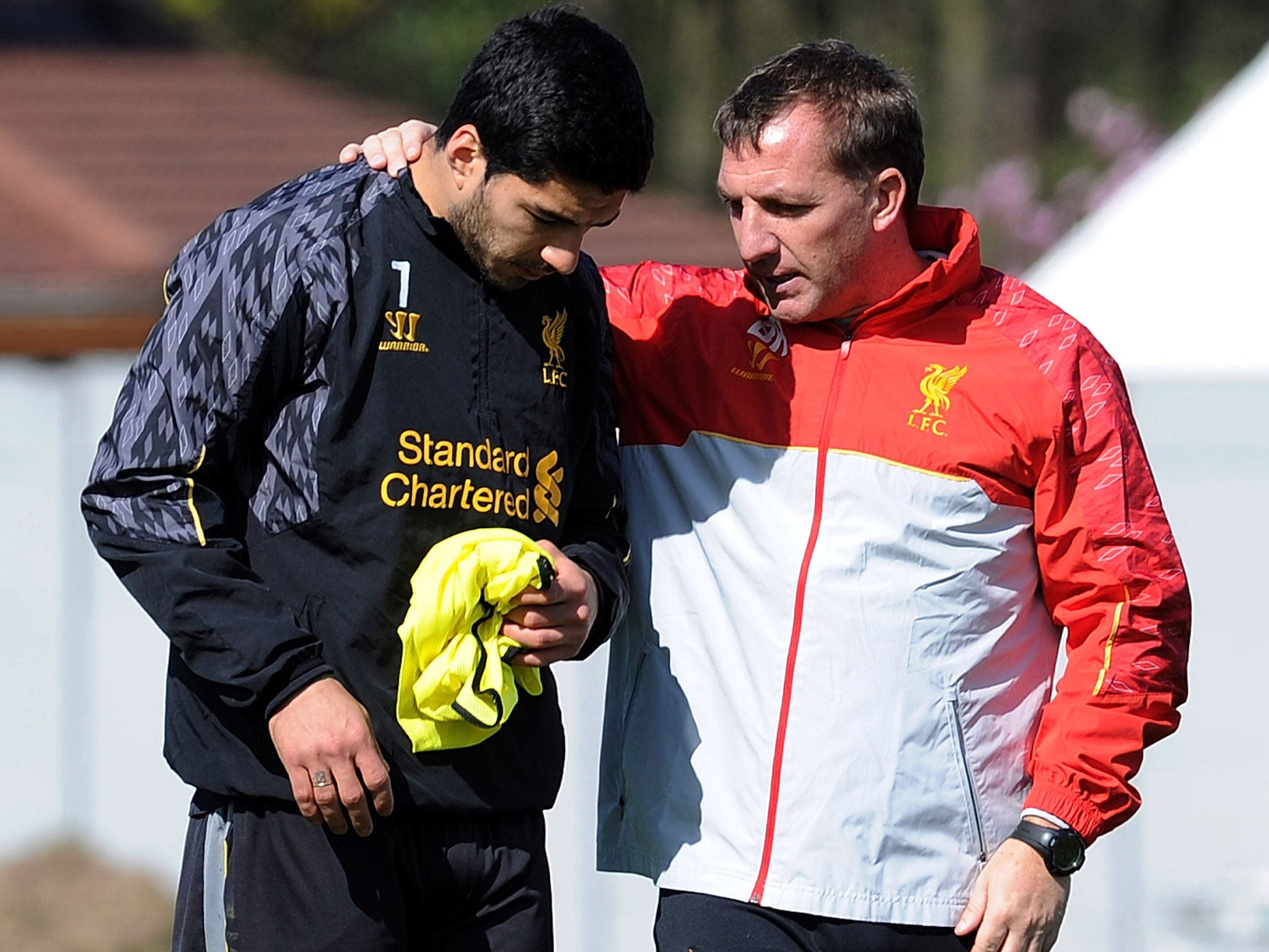 Luis Suarez (left) and Brendan Rodgers during Liverpool training last season