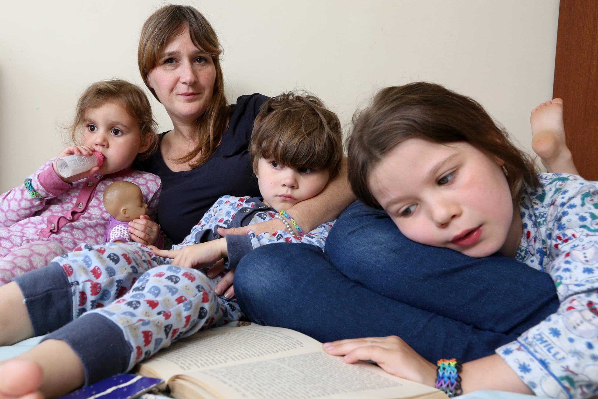 Journalist Rebecca Hardy with her three children, all of whom have shared a bed with her at some point in their lives.