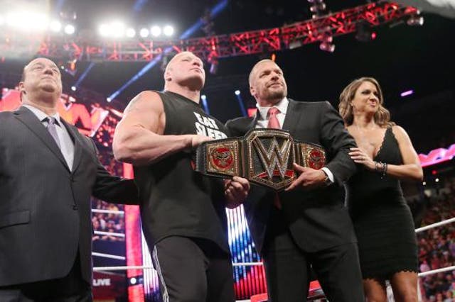 Heyman, Lesnar, Triple H and Stephanie put their best smiles on