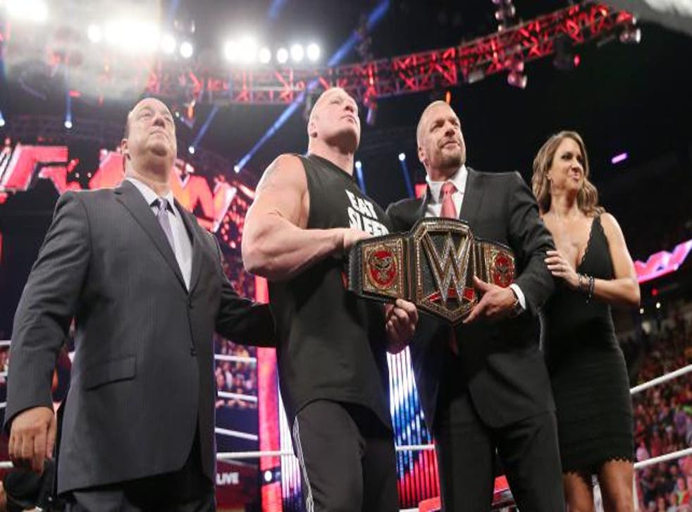 Heyman, Lesnar, Triple H and Stephanie put their best smiles on