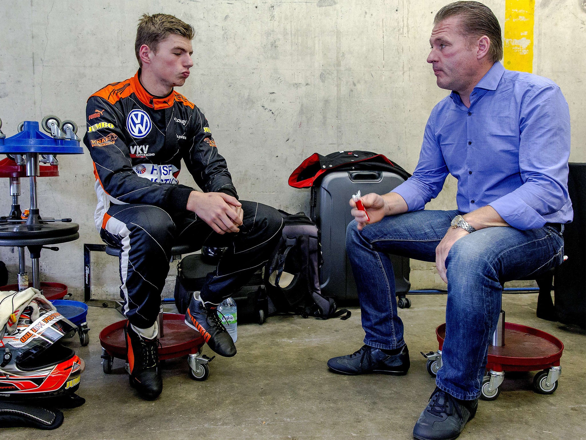 Max Verstappen (left), speaking with his father, the former F1 driver Jos Verstappen