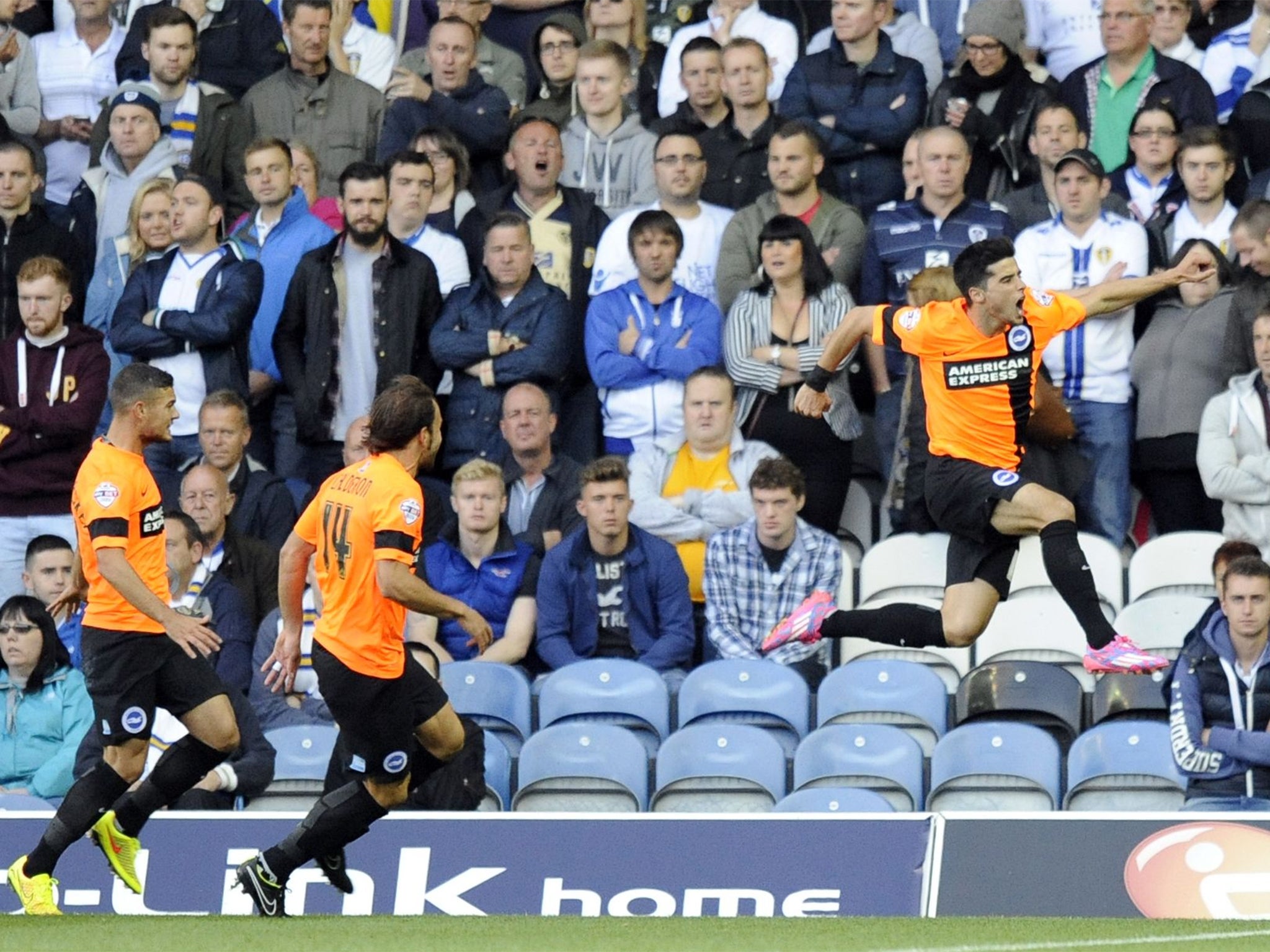 Joao Teixeira, the midfielder on loan from Liverpool, celebrates his opener for Brighton at Leeds