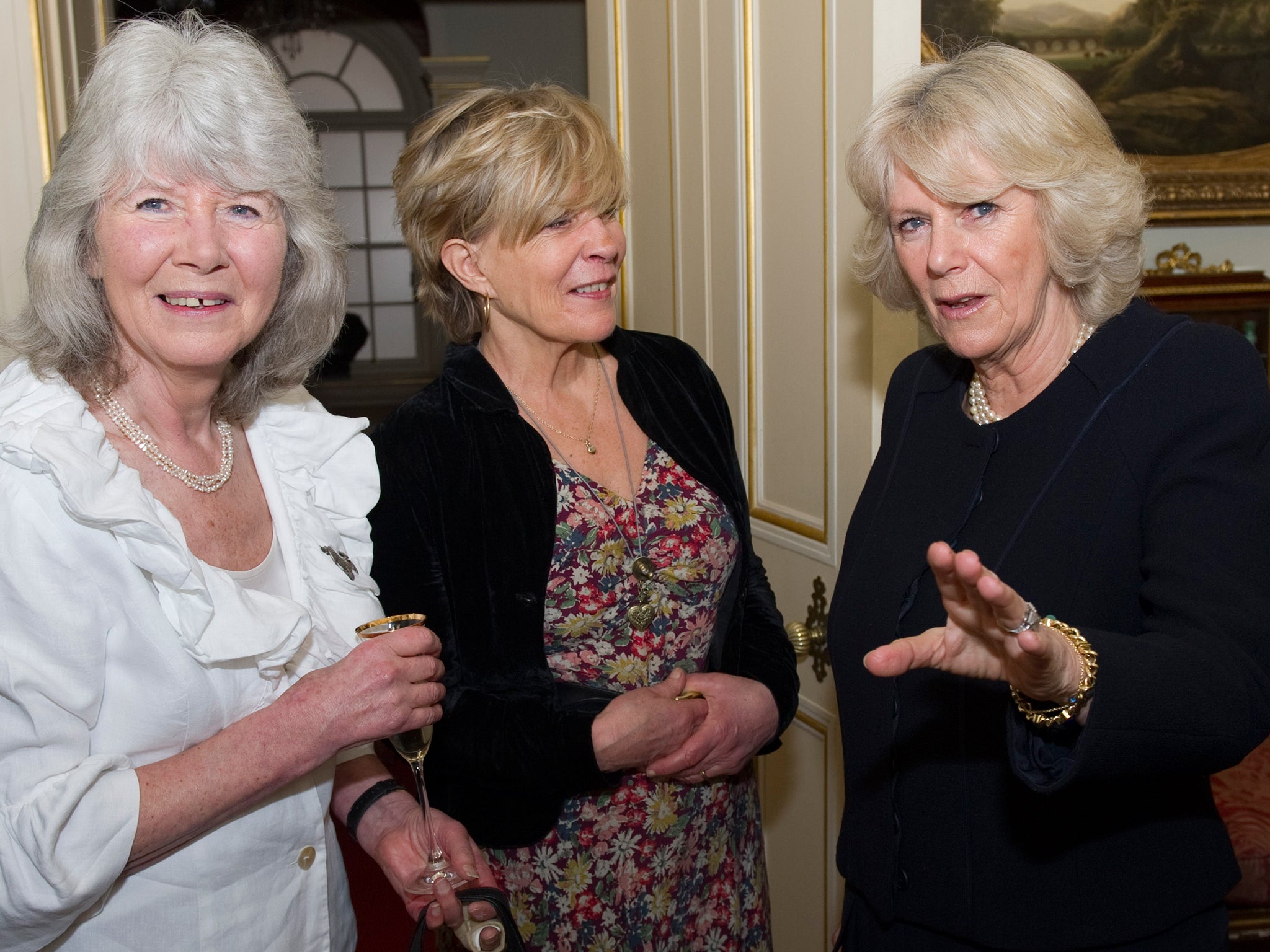 Lycett Green, centre, with the Duchess of Cornwall, right, in 2011