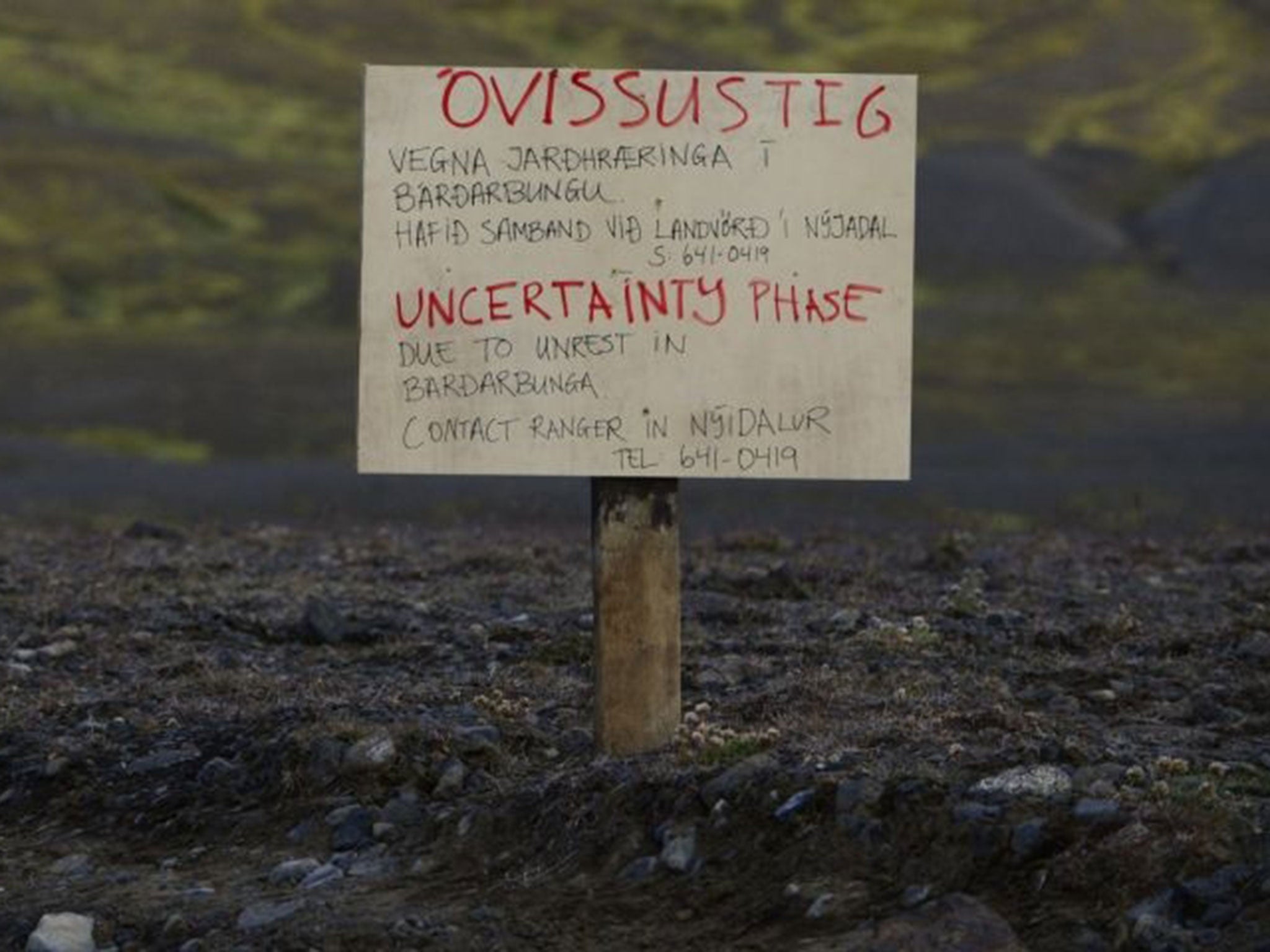 A warning sign blocks the road to Bardarbunga volcano