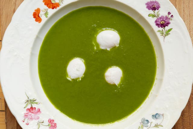 Parsley soup with poached quails' eggs