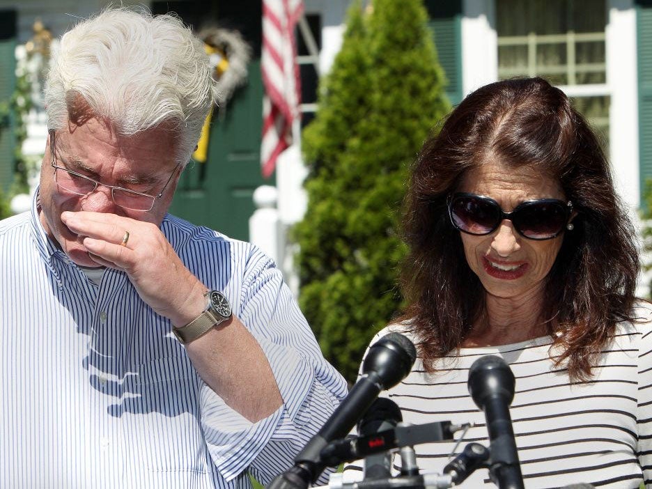 John and Diane Foley talk to reporters outside their home