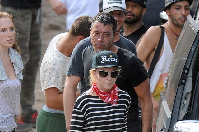 Guns'n'ammo theme: Madonna was on holiday near Cannes earlier this month