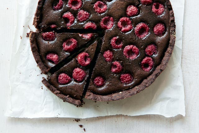 Serve Bill's chocolate and raspberry tart with extra fresh raspberries to contrast with the gooey ones inside