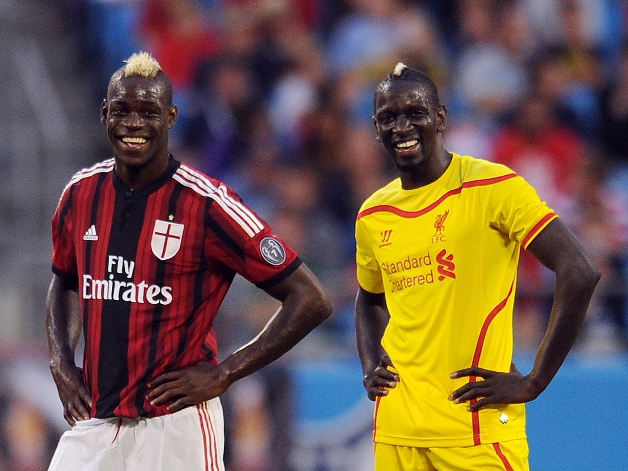 Mario Balotelli (left) shares a joke with Liverpool’s Mamadou Sakho during a friendly in the United States earlier this month