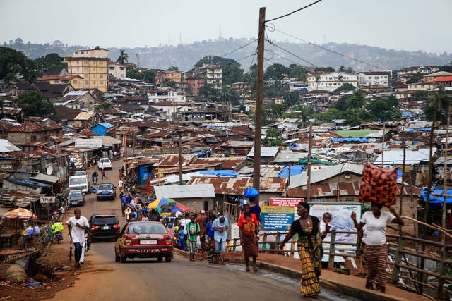 Day-to-day life in a slum  in the Ebola-affected Freetown, capital of Sierra Leone, where mining had been thriving before the outbreak 