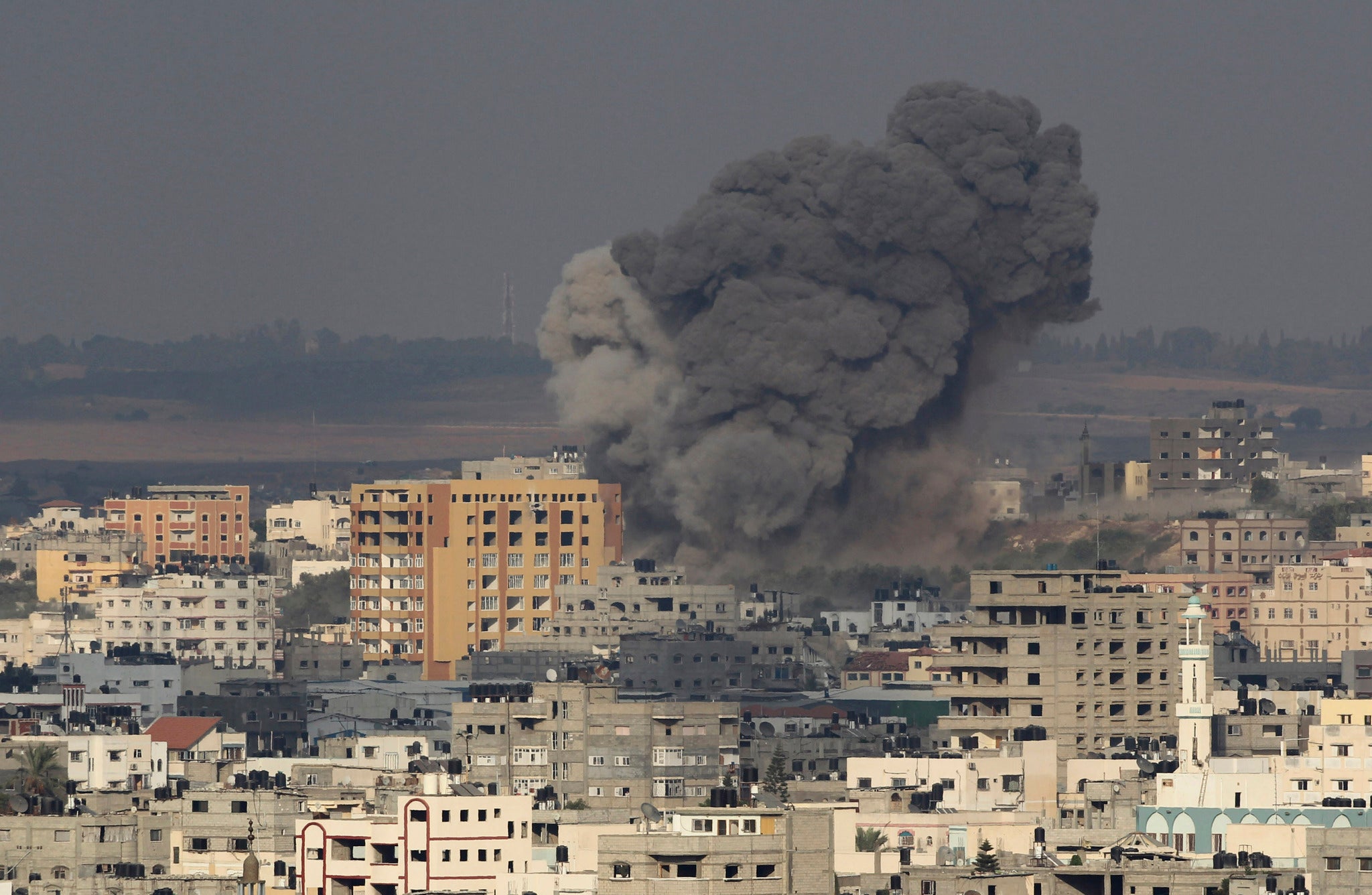 Smoke rises following what witnesses said was an Israeli air strike in Gaza on 22 August 22