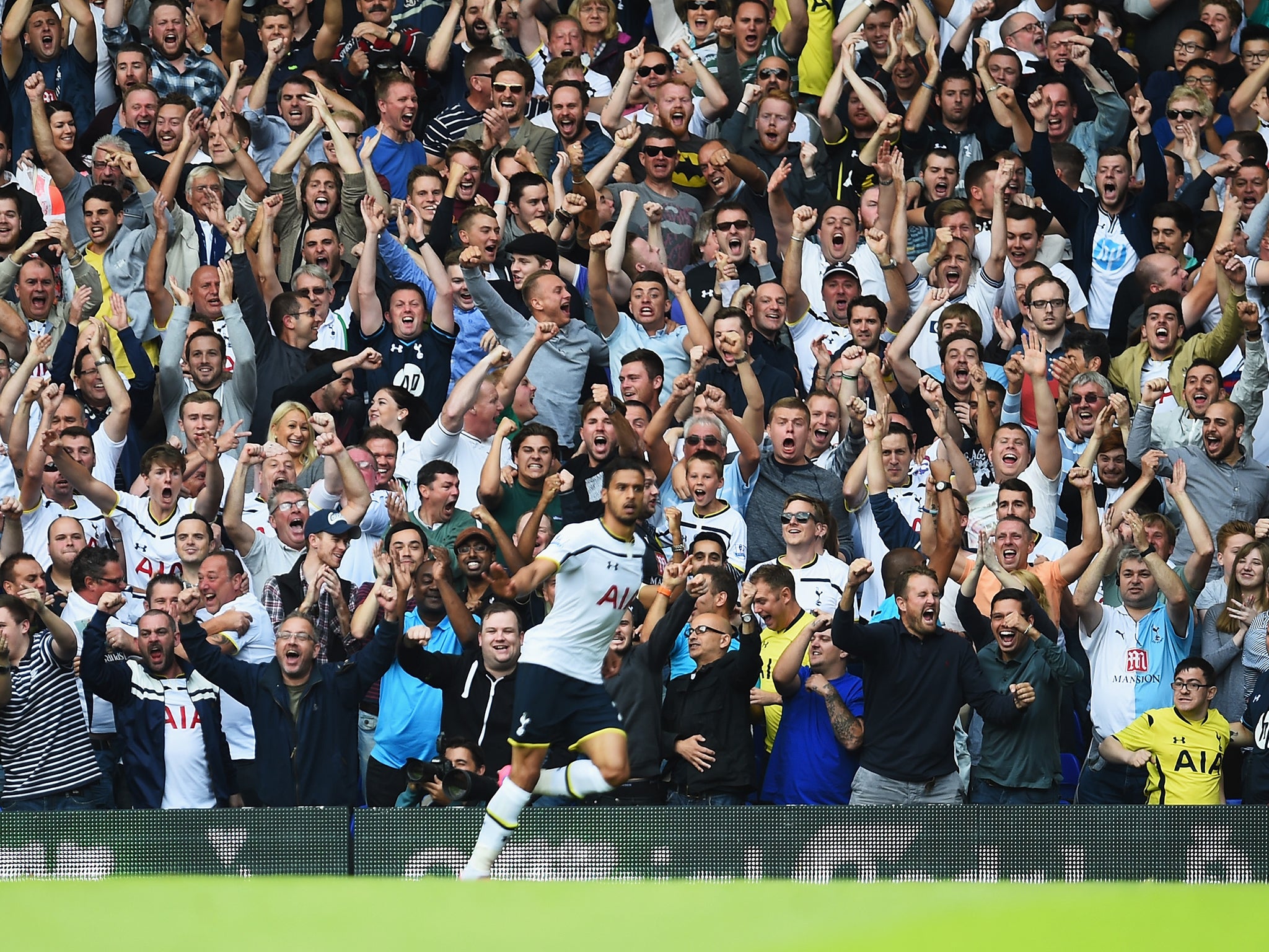 Nacer Chadli celebrates after opening the scoring against QPR