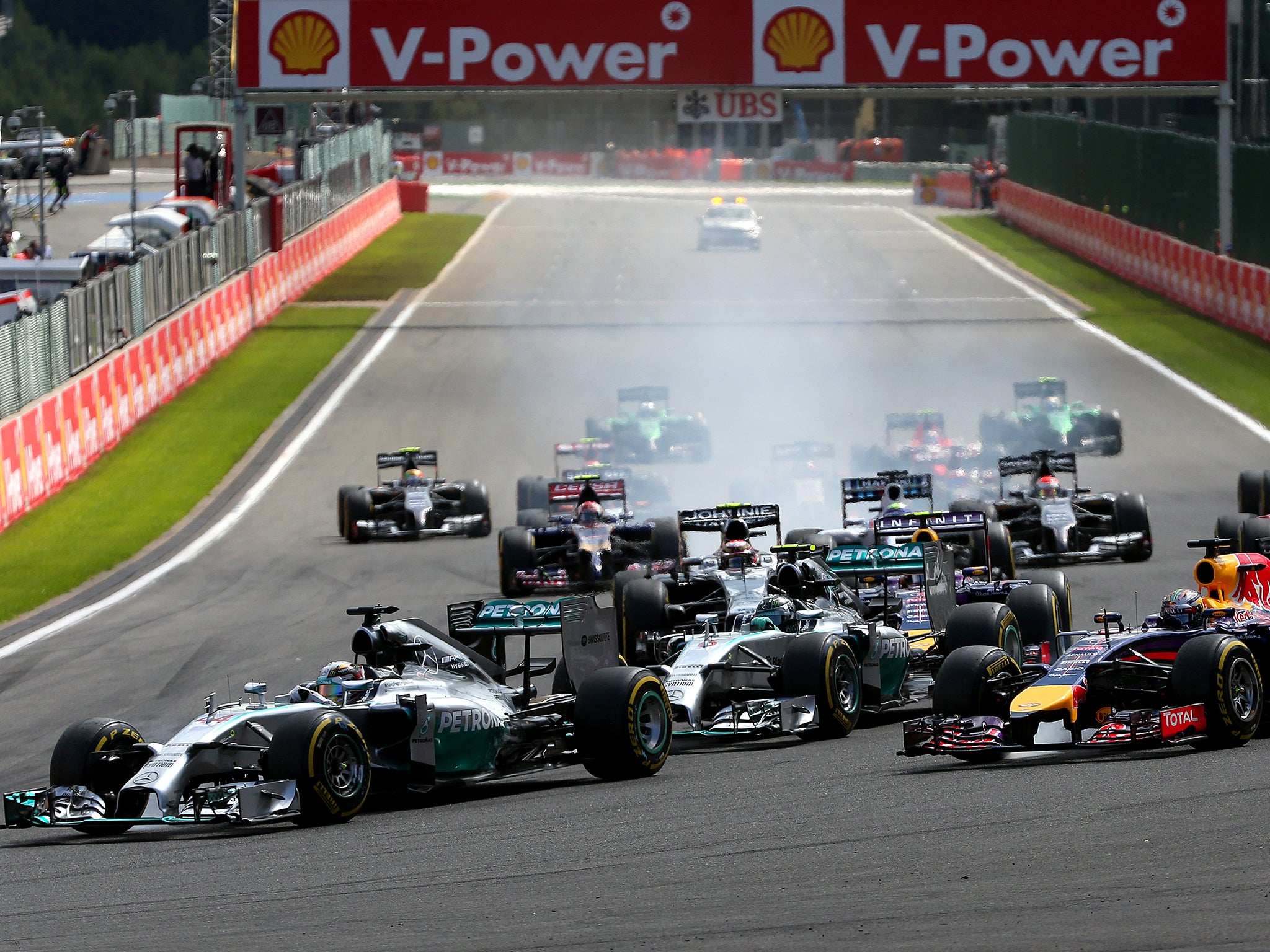 Lewis Hamilton takes the lead at the start of the race