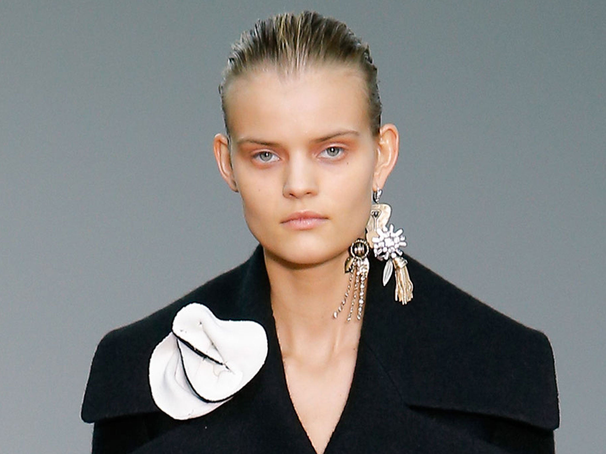 Earring, Mislaid
This is a short, sweet and somewhat odd accessory look for autumn/winter 2014: the single earring. It is championed by two of the world’s most copied designers – Nicolas Ghesquière at Louis Vuitton and Phoebe Philo at Céline (below) – so