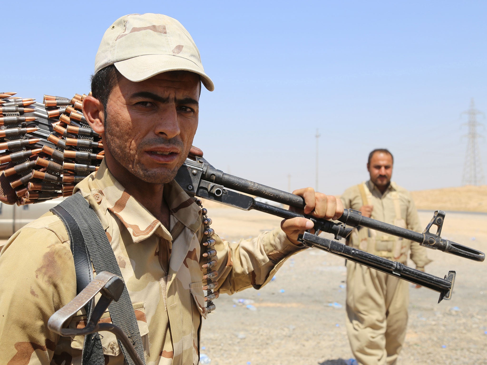 Kurdish Peshmergas fight to regain control of the Iraqi town of Celavle from Isis