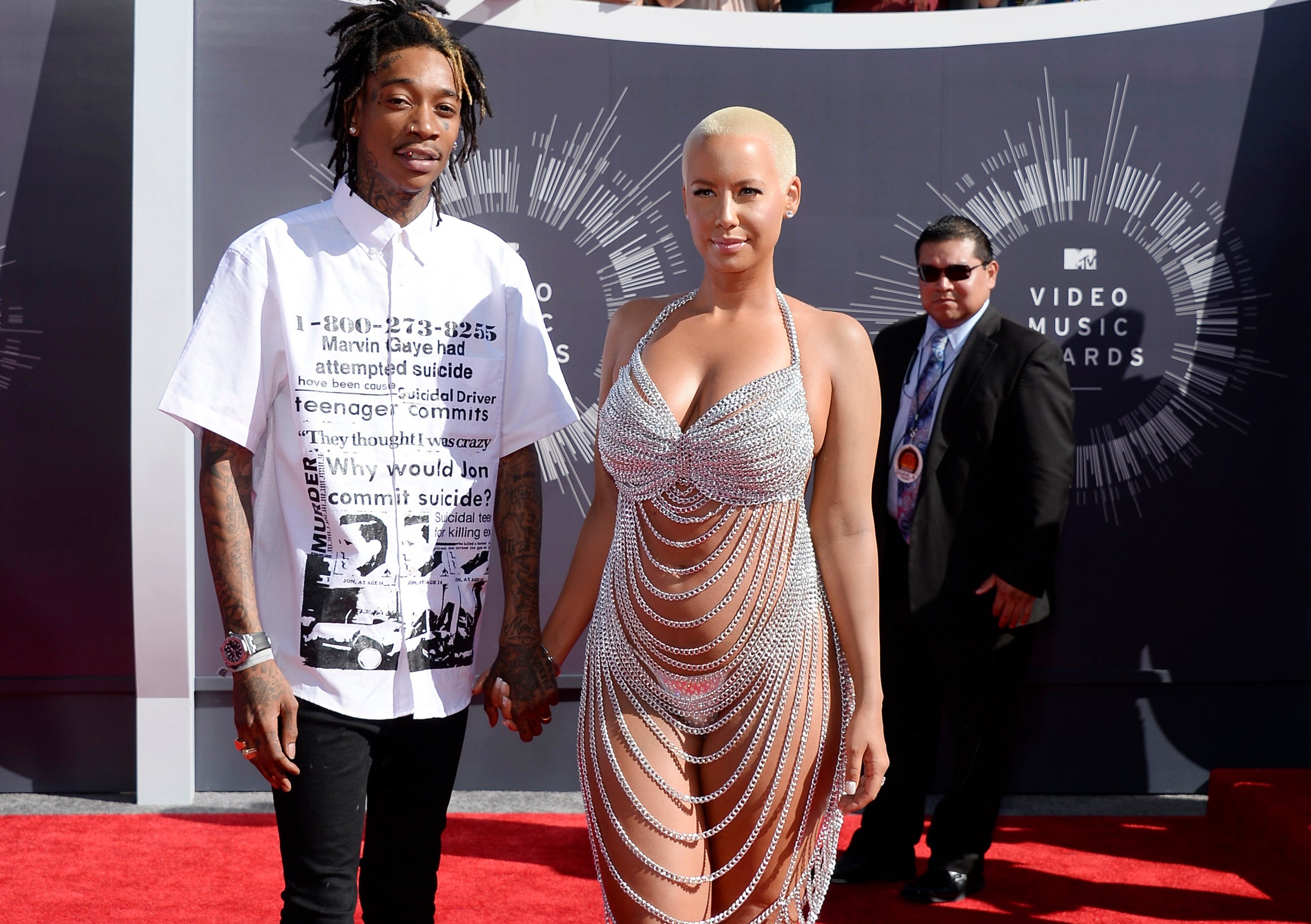 Amber Rose emulated Rose McGowan in a silver chain dress at yesterday's VMAs