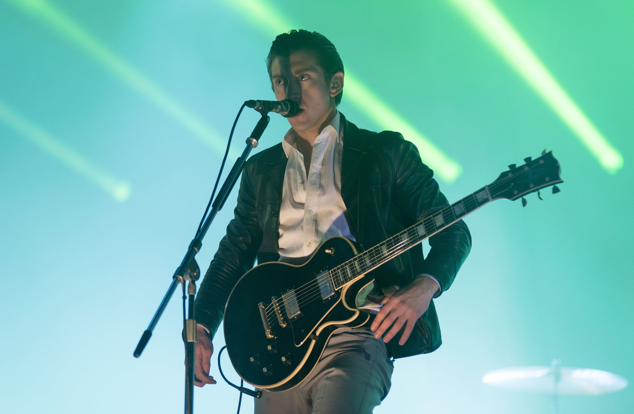 Arctic Monkeys played at Reading Festival but Alex Turner’s new-found suave attitude feels somewhat forced and distant, Giles Bidder says