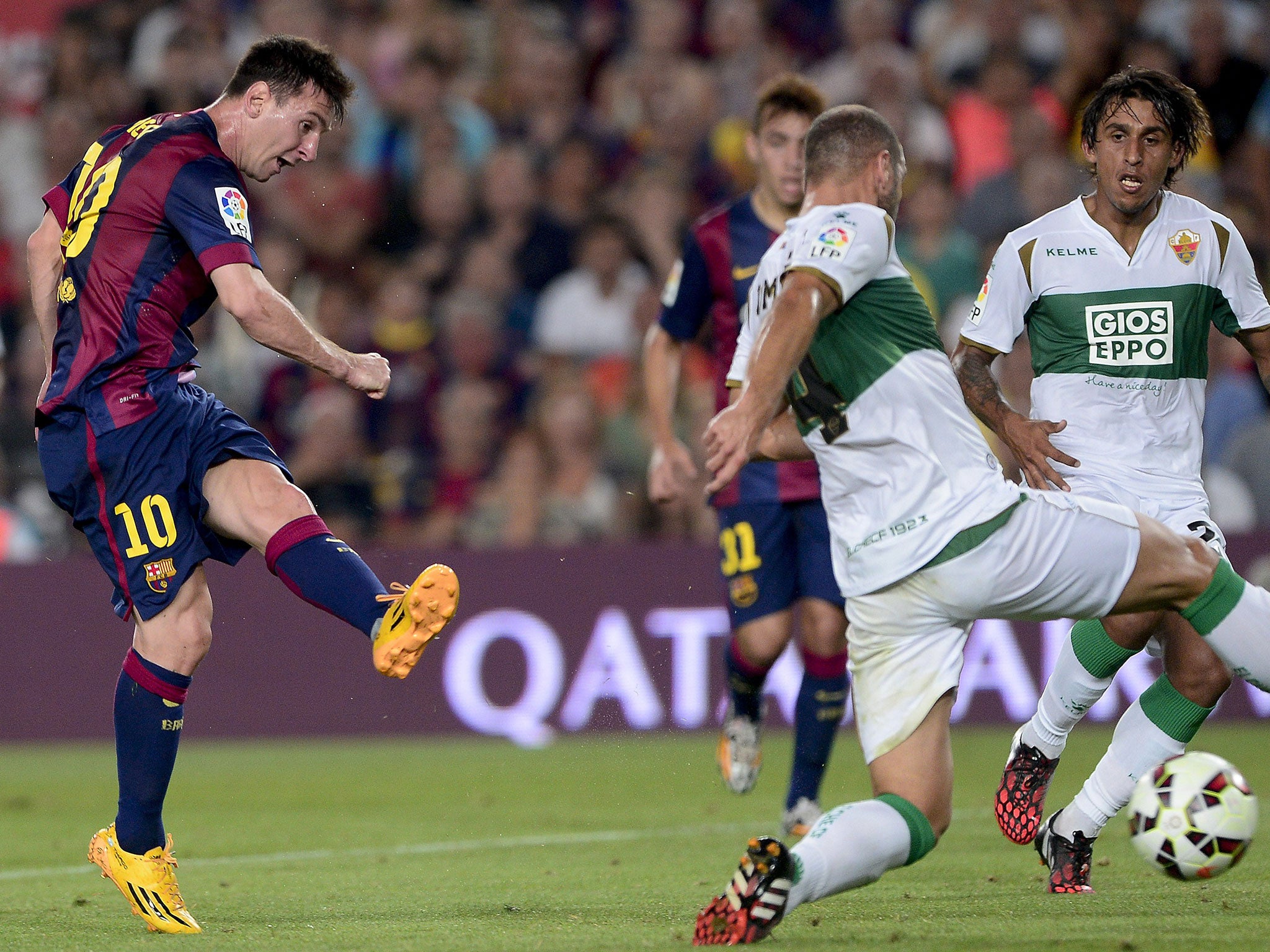 Lionel Messi scored twice as 10-man Barcelona beat Elche 3-0