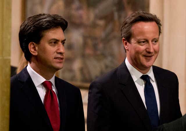 David Cameron and Ed Miliband attend the Queen's Speech on 4 June 2014