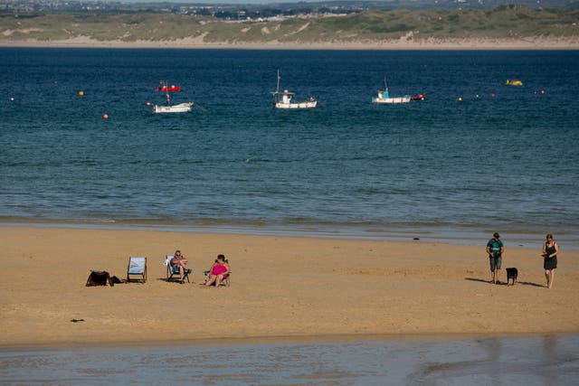 <p>Sunseekers in St Ives before the pandemic</p>