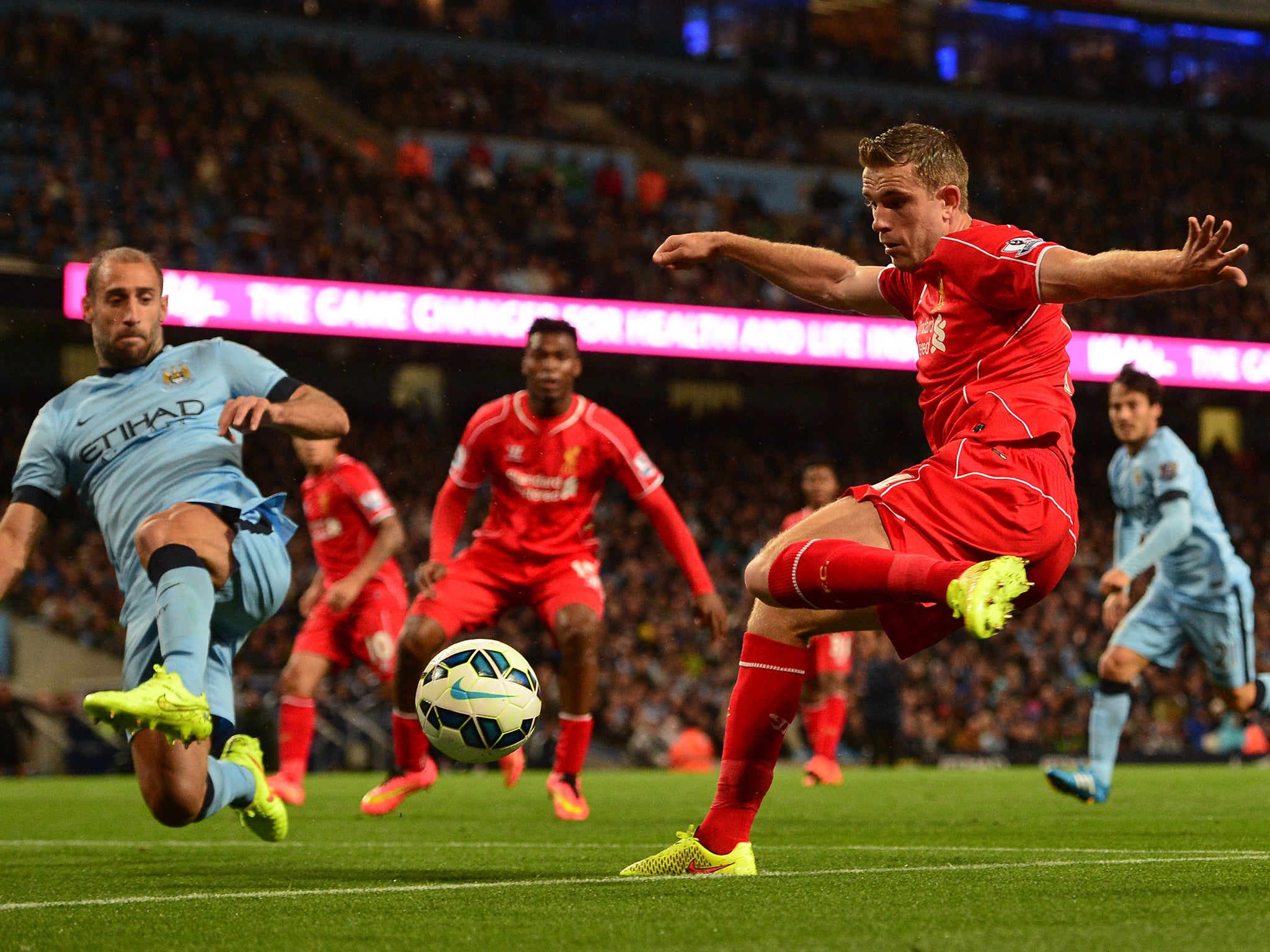 Henderson in action against Manchester City last night