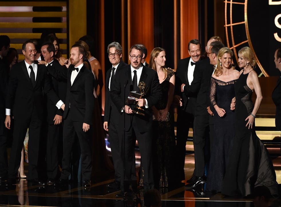 The Breaking Bad cast gather behind creator Vince Gilligan to accept the outstanding drama series prize