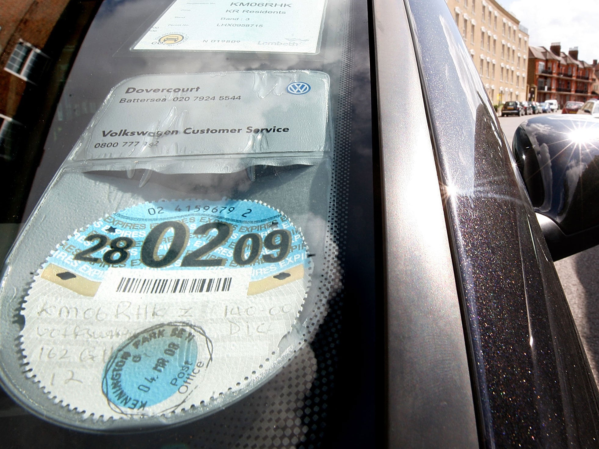 A car tax disc displayed in London