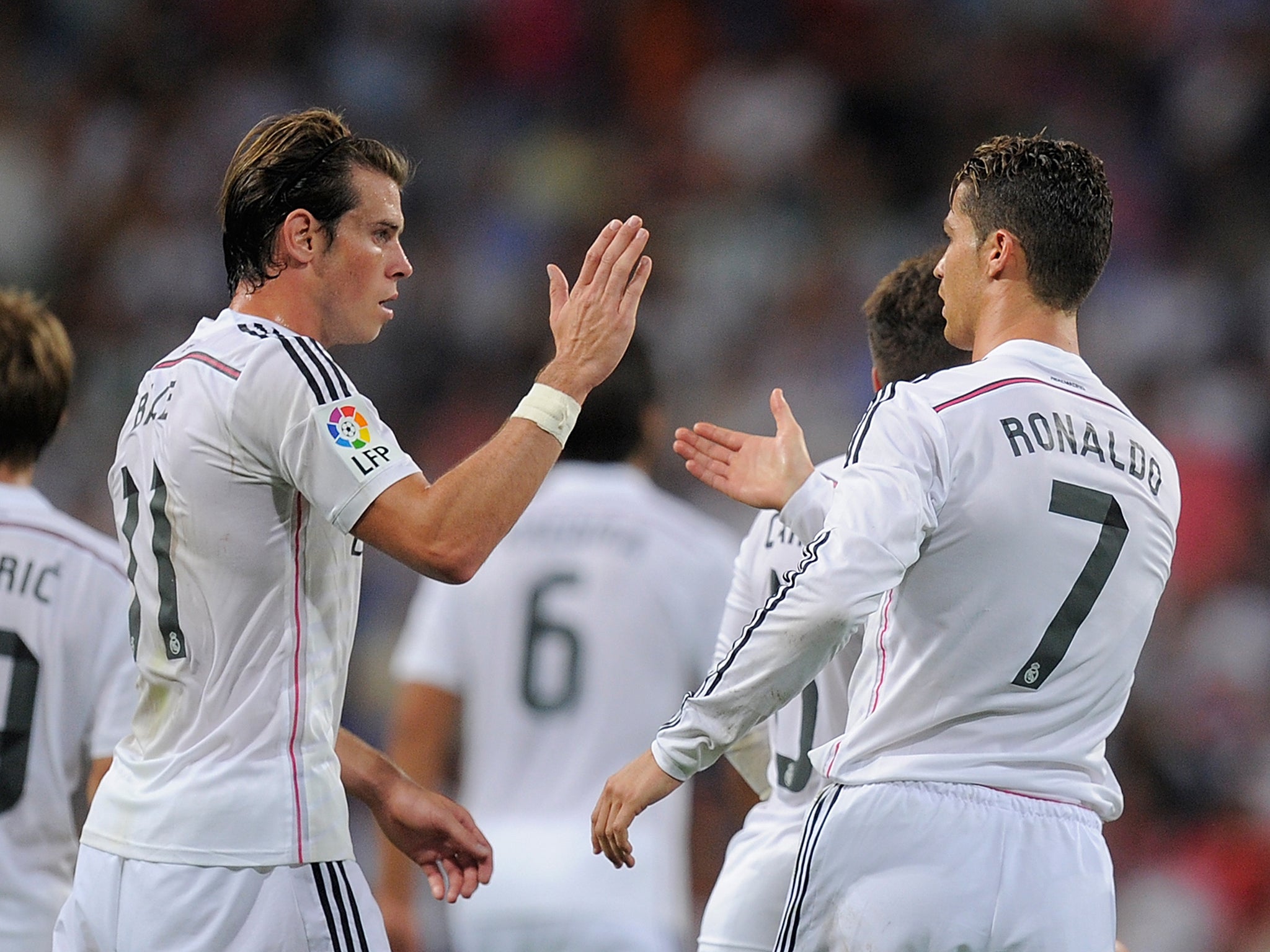 Cristiano Ronaldo of Real Madrid celebrates with Gareth Bale after scoring