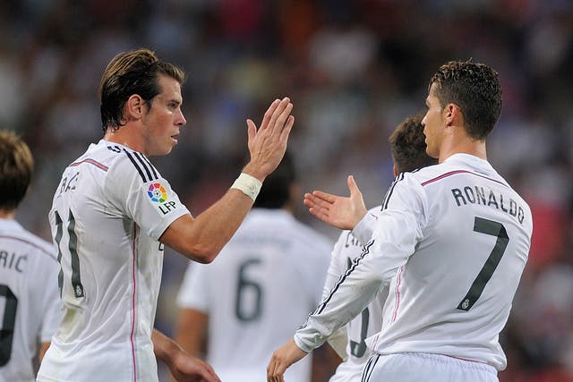 Cristiano Ronaldo of Real Madrid celebrates with Gareth Bale after scoring 