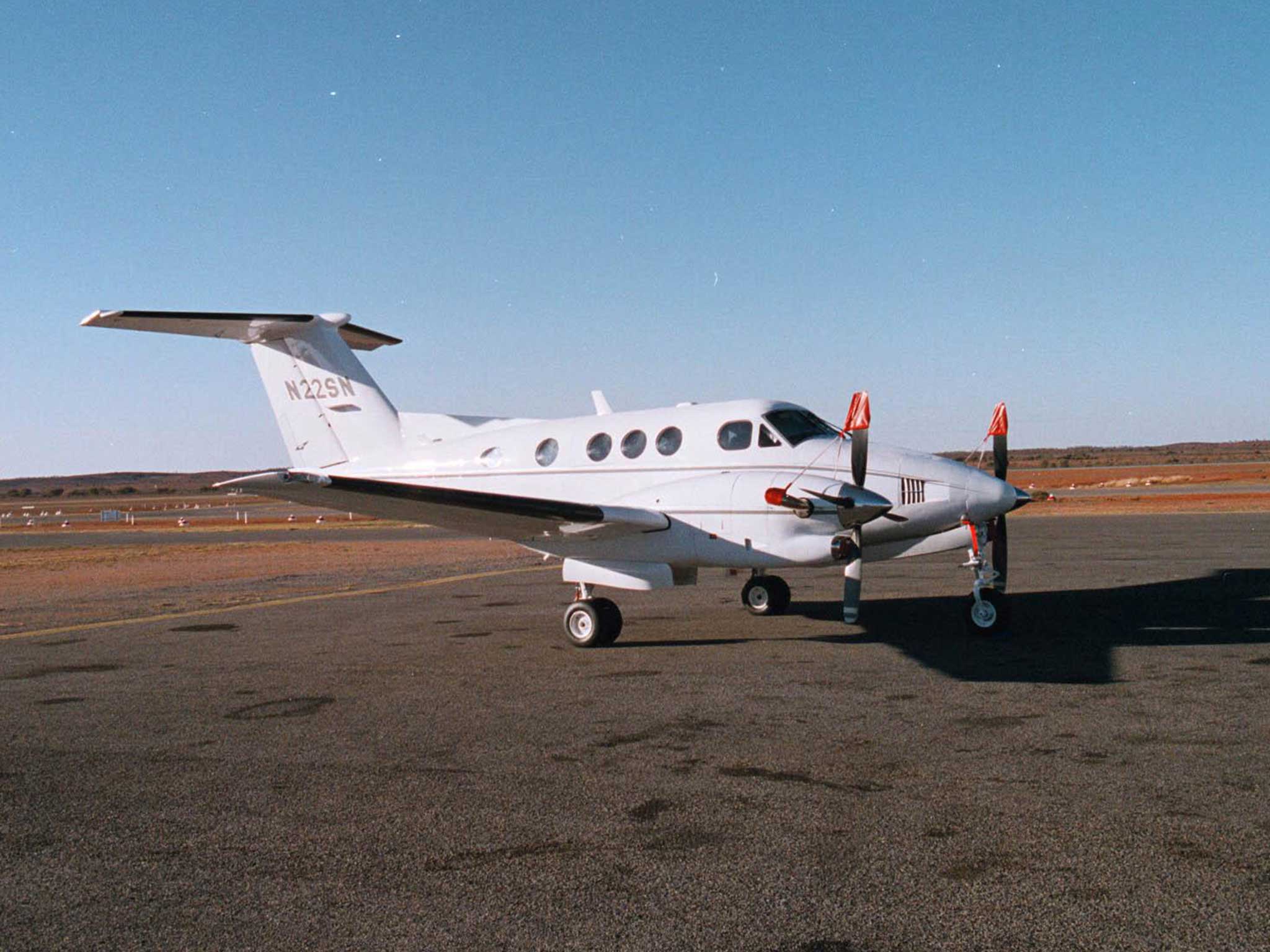 A light aircraft, similar to the one safely landed, sitting on a runway in Australia