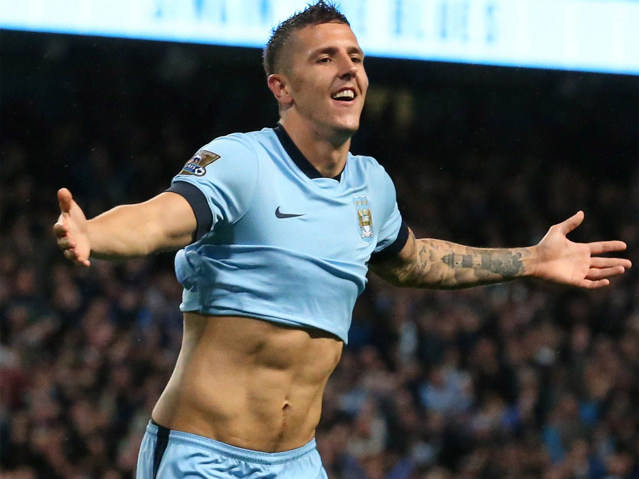 Ab fab: Stevan Jovetic scores his second goal against Liverpool on Monday night