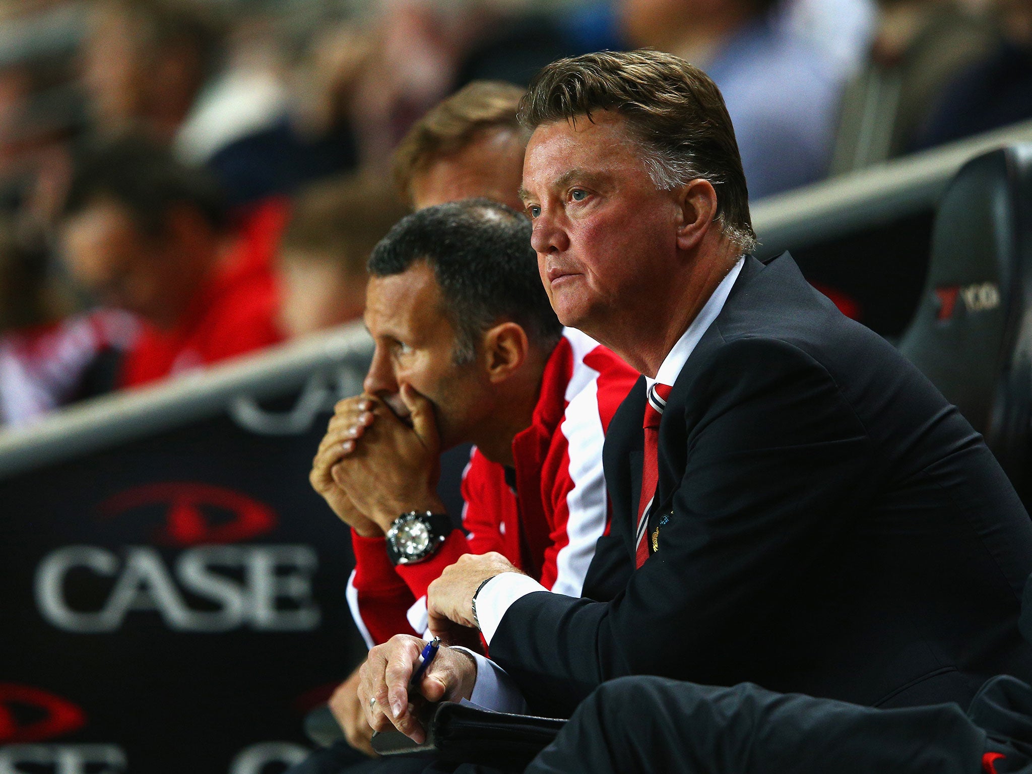 Louis van Gaal (right) and Ryan Giggs look on from the touchline during the 4-0 MK Dons defeat