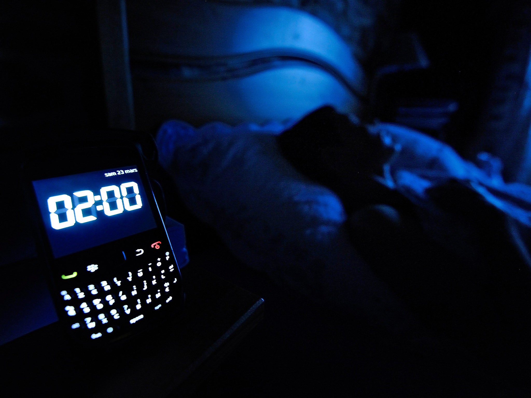 80 per cent of us keep our phones on overnight, with 50 per cent using them as an alarm clock