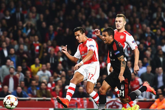 Alexis Sanchez fires home on the stroke of half-time to make it 1-0 to Arsenal