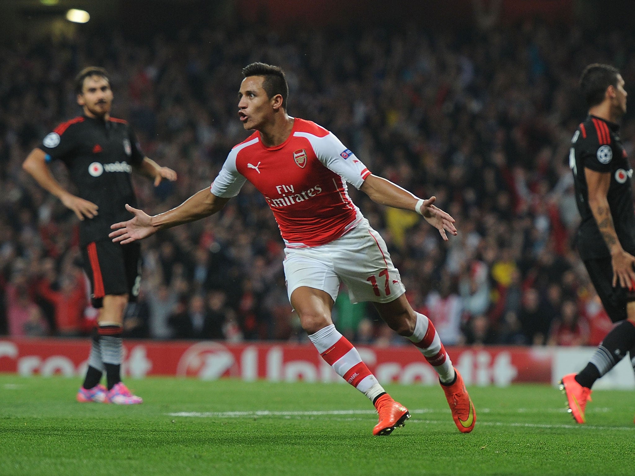 Alexis Sanchez celebrates after scoring his first goal for Arsenal in the Champions League qualifier against Besiktas