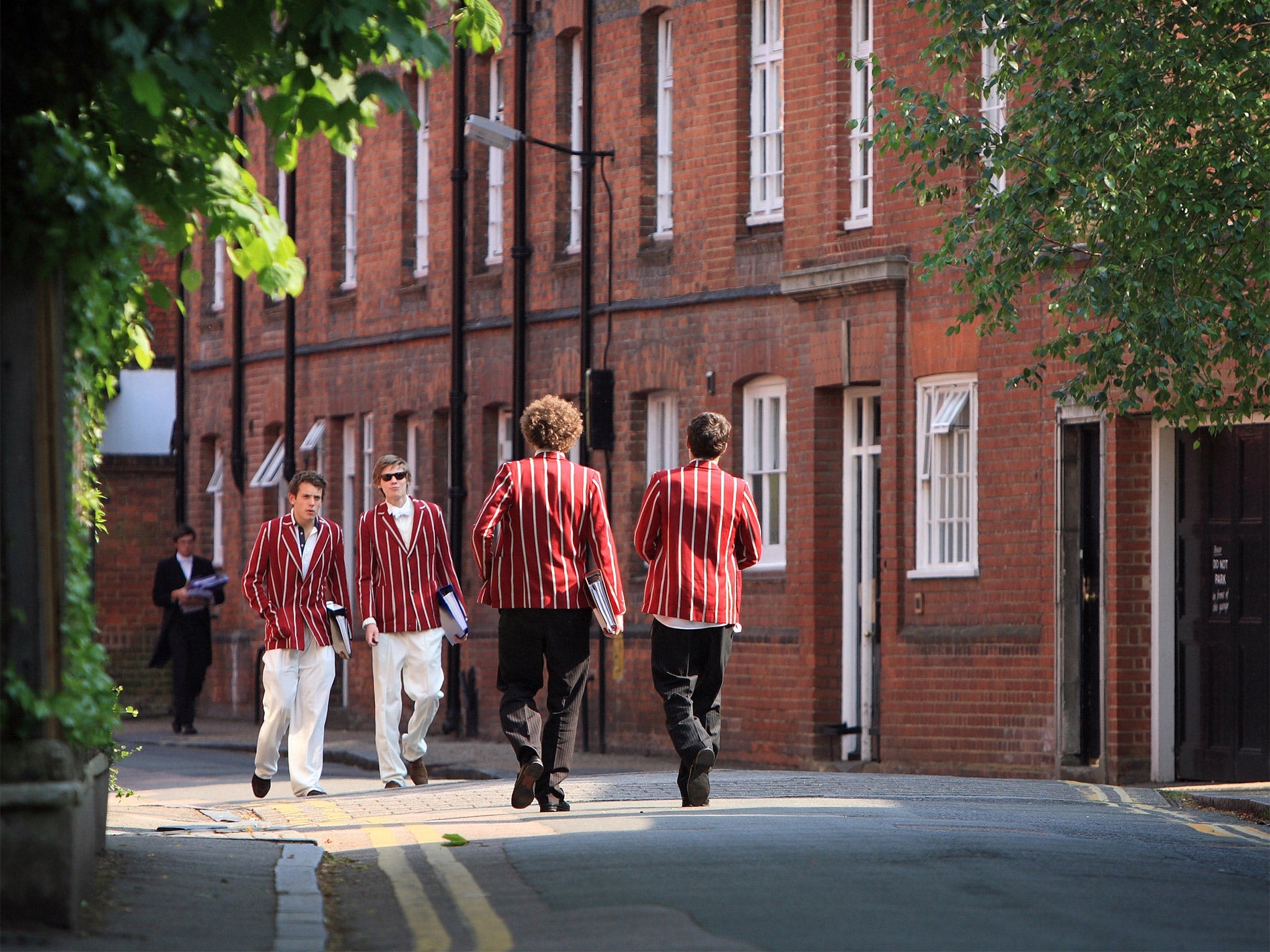 Pupils educated at private schools like Eton (pictured) go on to earn 17 per cent more than those from state schools