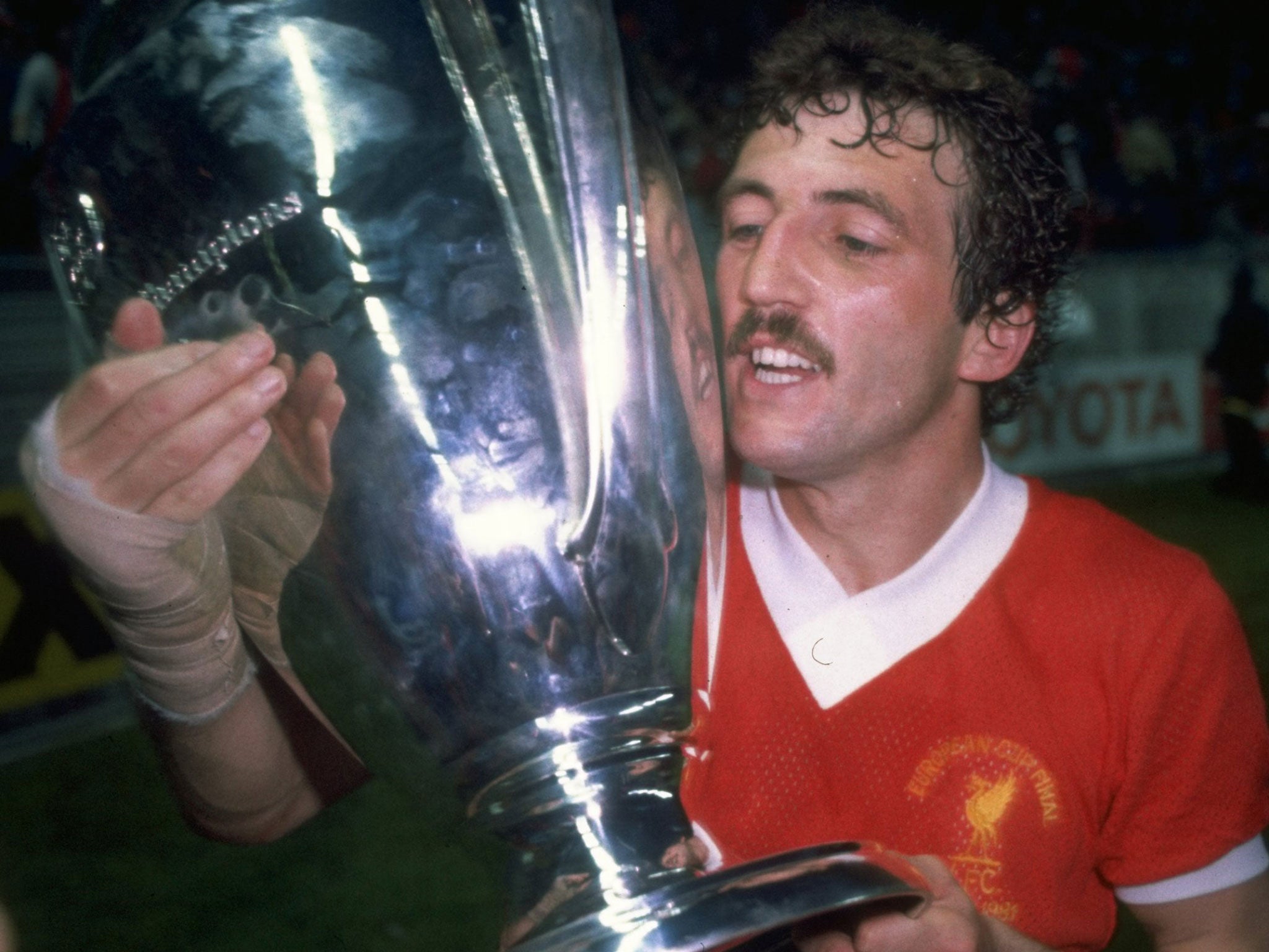 Alan Kennedy lifts the European Cup after Liverpool defeated Real Madrid in 1981