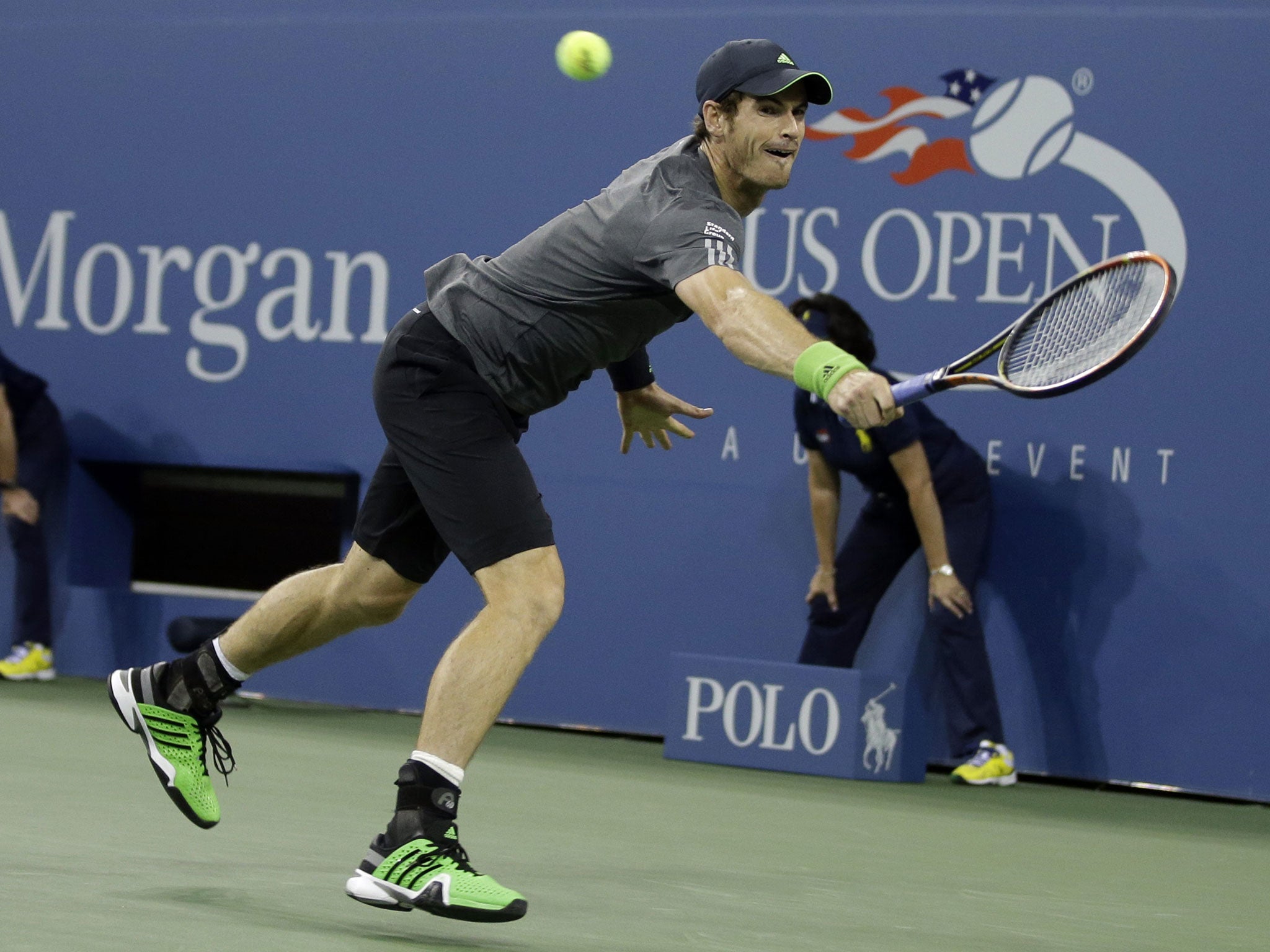 Andy Murray stretches for the ball during his straight sets second round win at Flushing Meadows