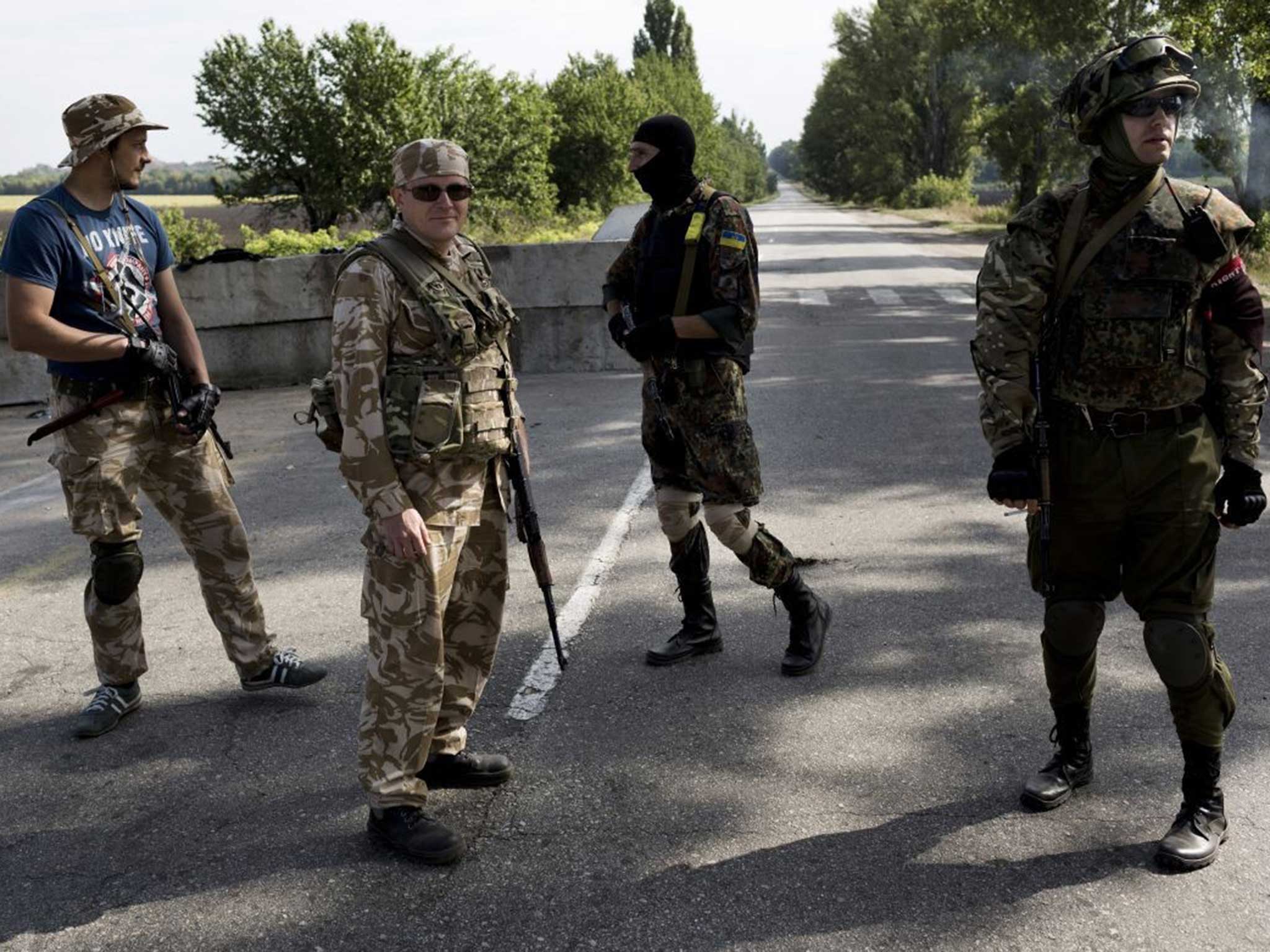 Armed men from the ultra nationalist party Right Sector and guards under orders of the Ukrainian