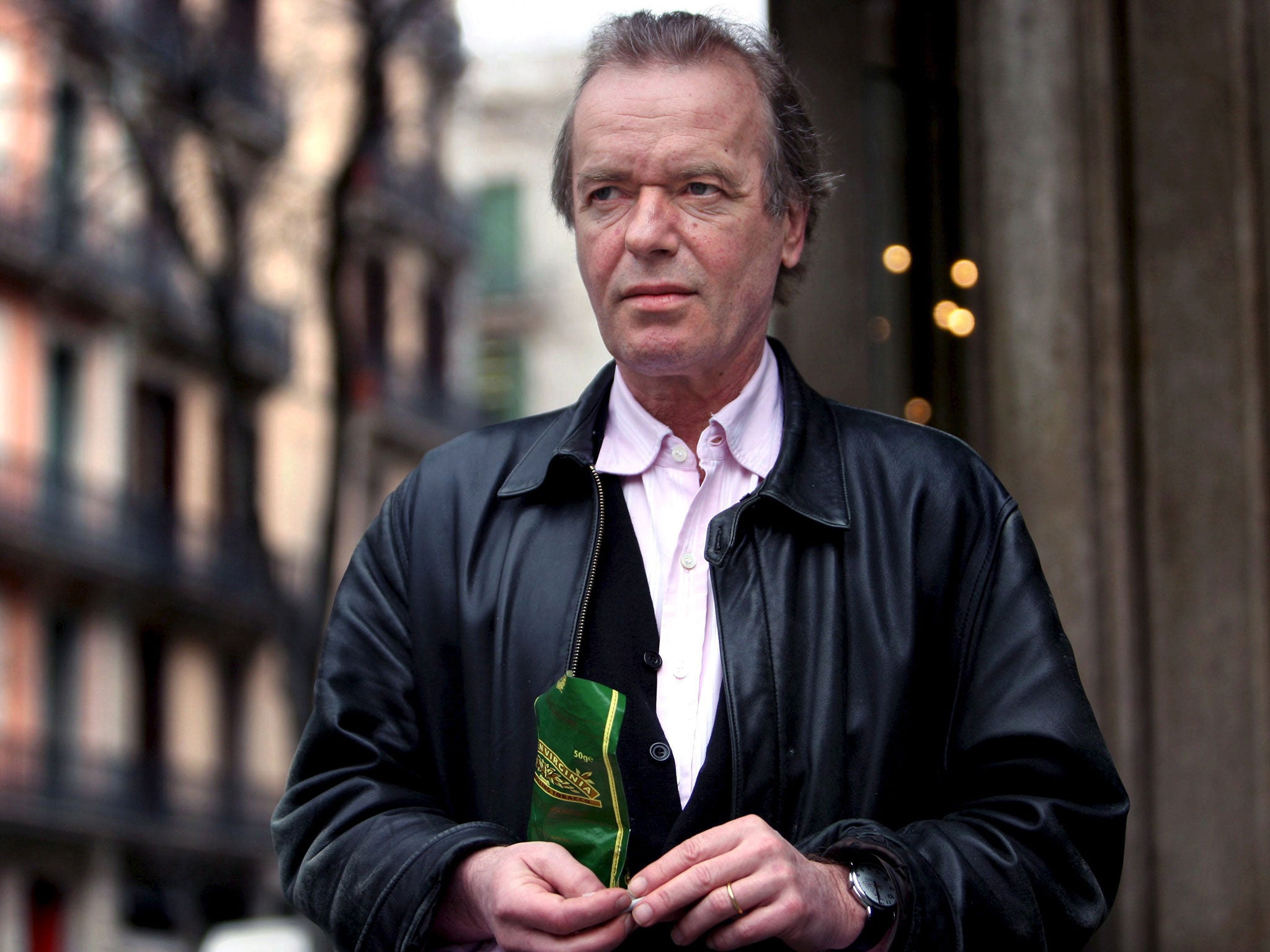 Writer Martin Amis has indicated that he may return to Britain