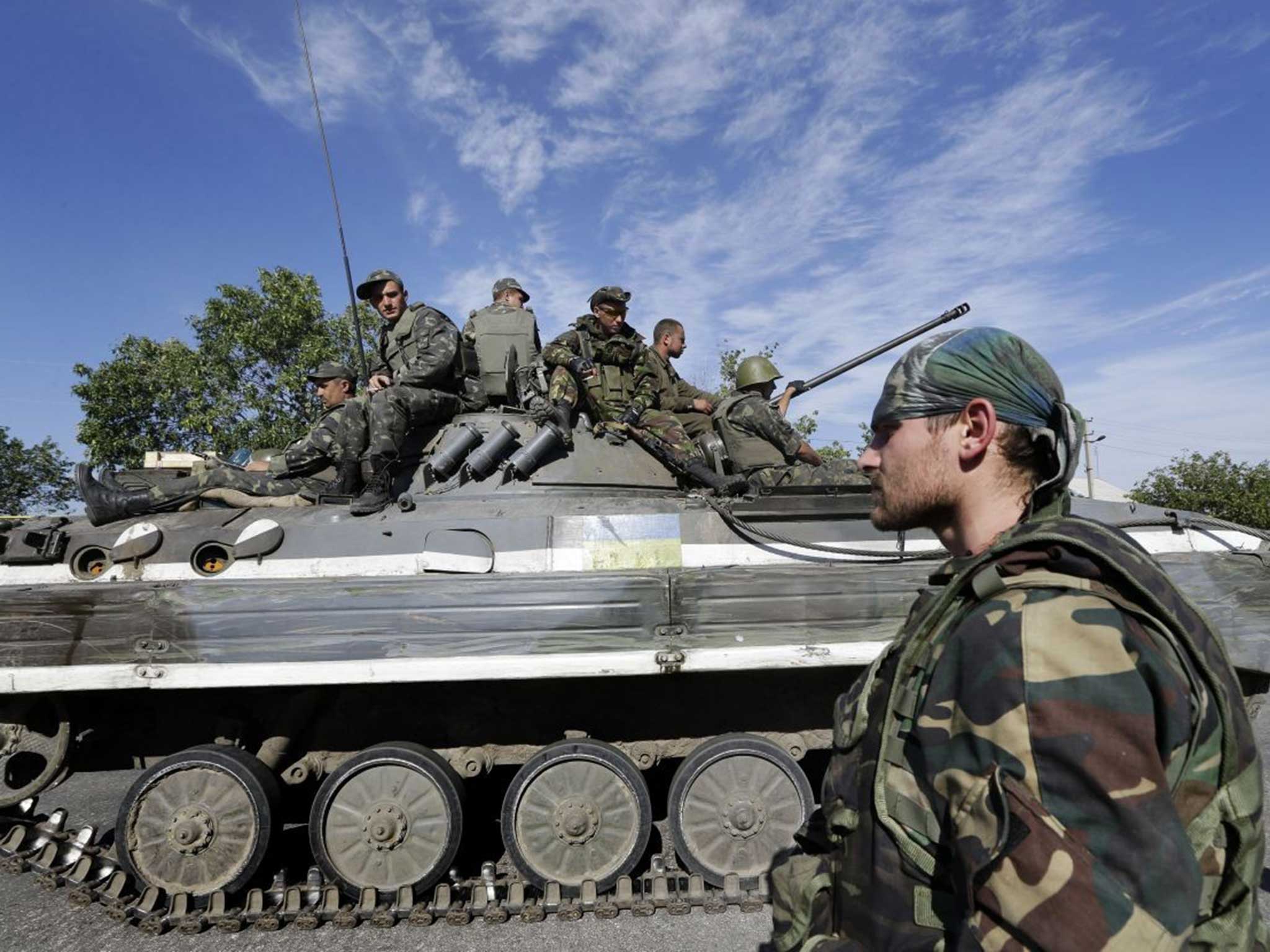 Ukrainian government troops have retreated from the area near Luhansk airport after overnight clashes