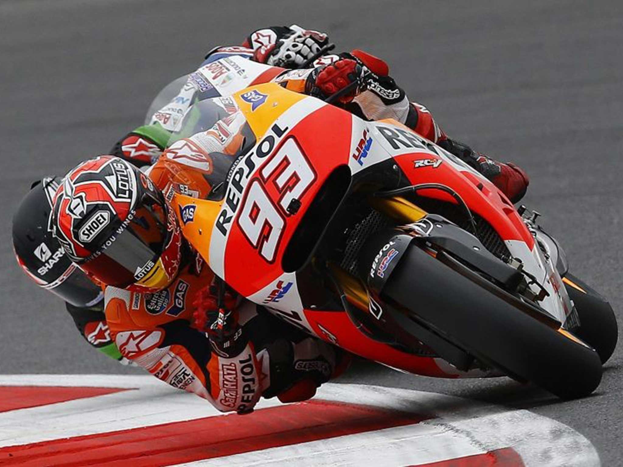 Lean time over: Marc Marquez leads Briton Scott Redding in qualifying at Silverstone after coming fourth last time