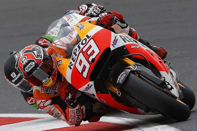 Lean time over: Marc Marquez leads Briton Scott Redding in qualifying at Silverstone after coming fourth last time 