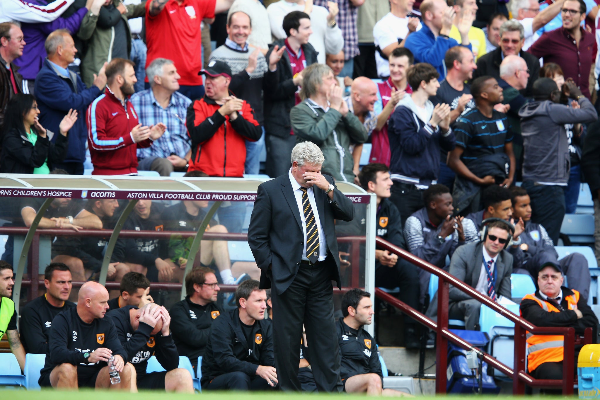 Hull City boss Steve Bruce can barely watch in the first half