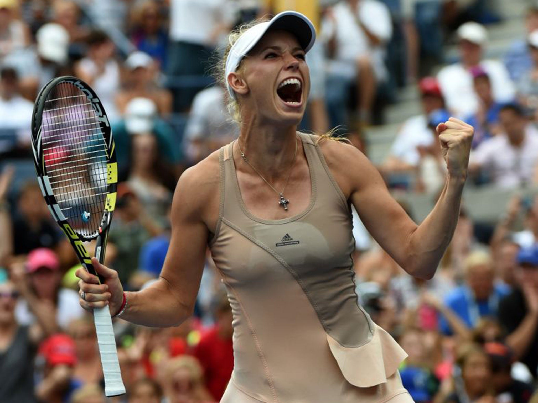 Caroline Wozniacki savours her victory over Maria Sharapova on Sunday