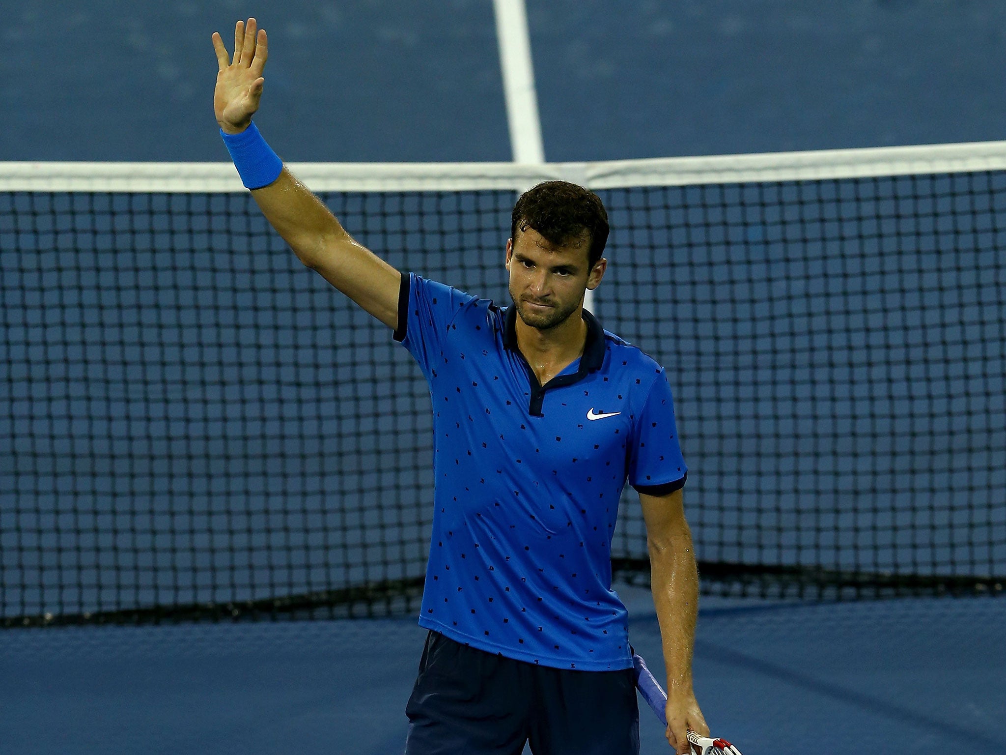 Grigor Dimitrov celebrates victory over David Goffin