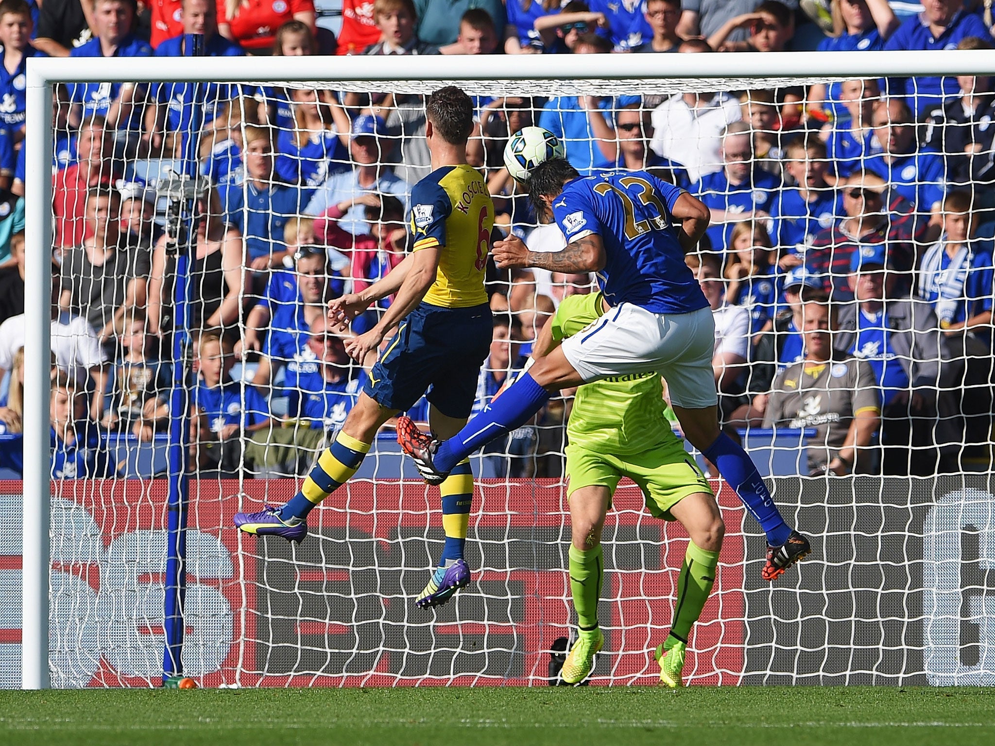 Leicester striker Leonardo Ulloa scores a header against Arsenal in the 1-1 draw