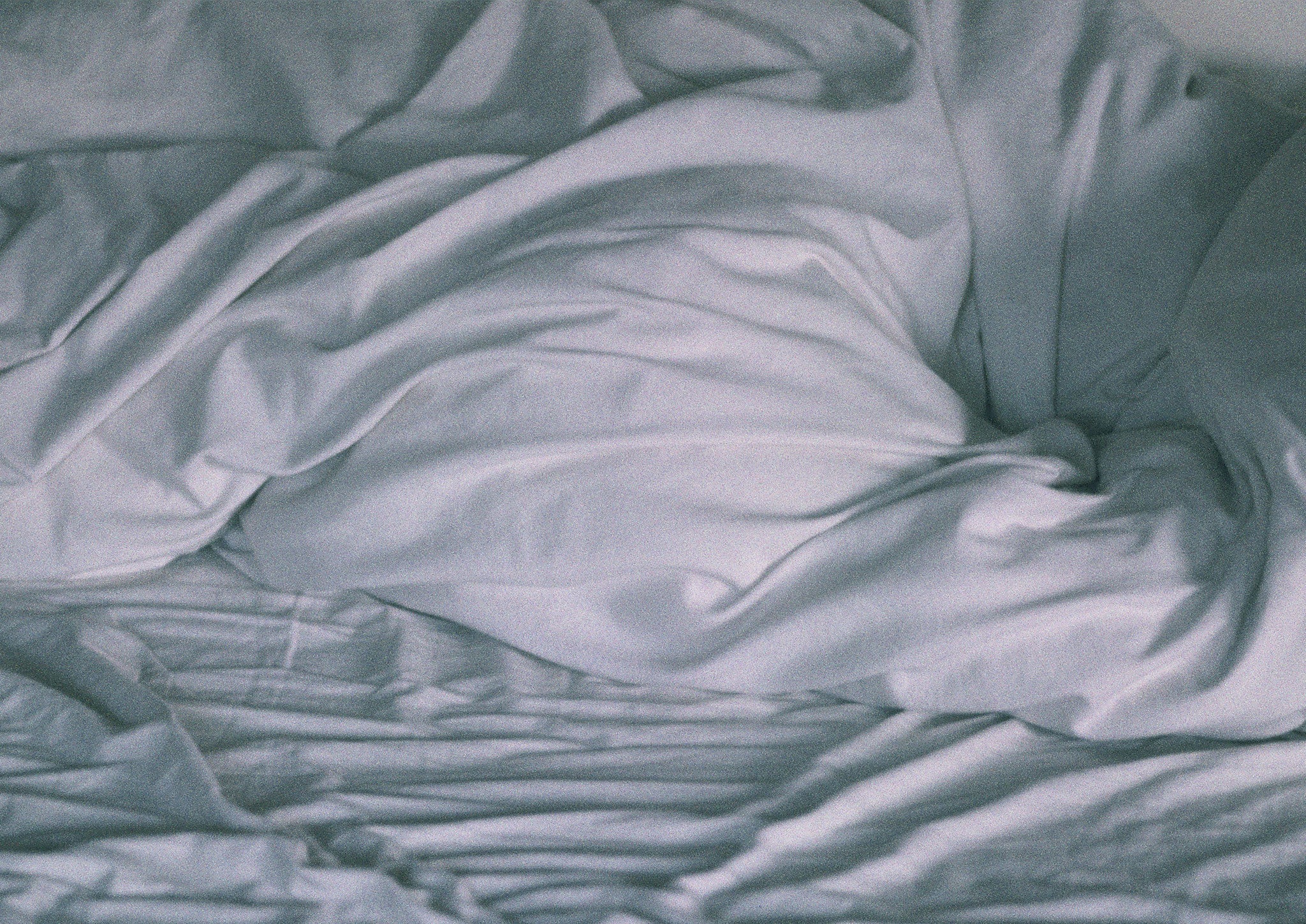 Crumpled bed sheets